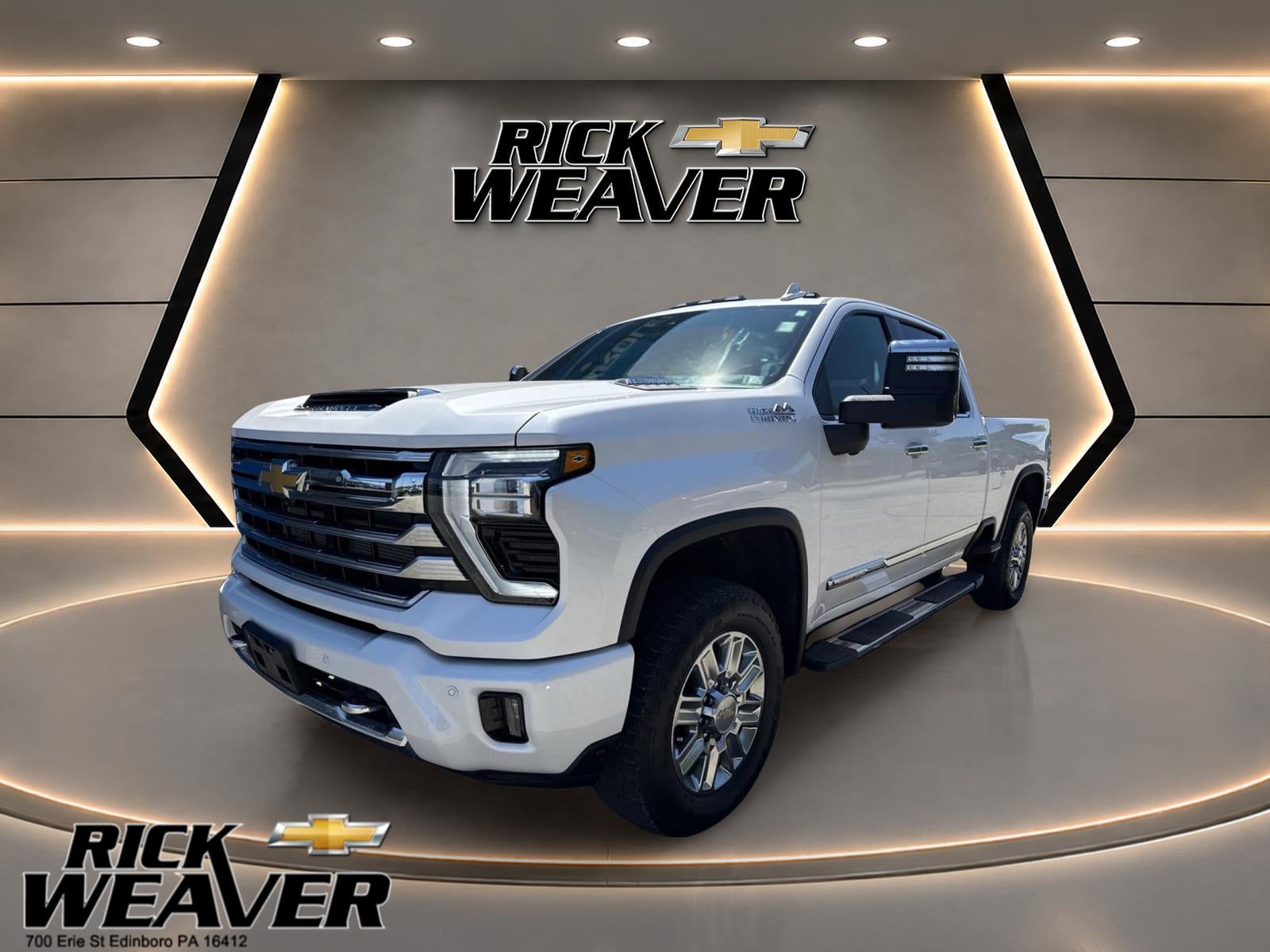2024 Chevrolet Silverado 2500 HD High Country in Iridescent Pearl Tricoat — front three-quarter view