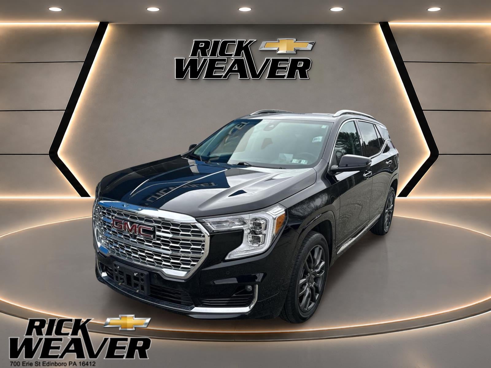 2024 GMC Terrain Denali in Ebony Twilight Metallic — front three-quarter view