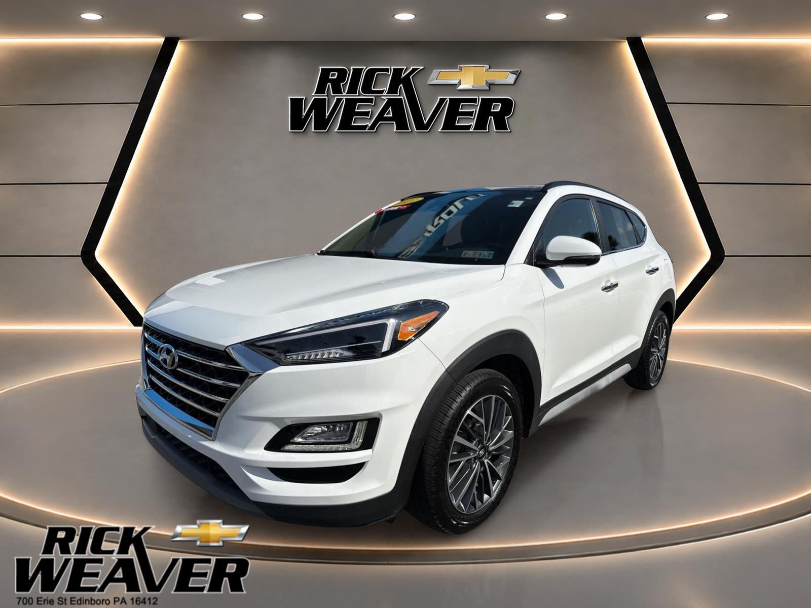 2021 Hyundai Tucson Ultimate in White — front three-quarter view