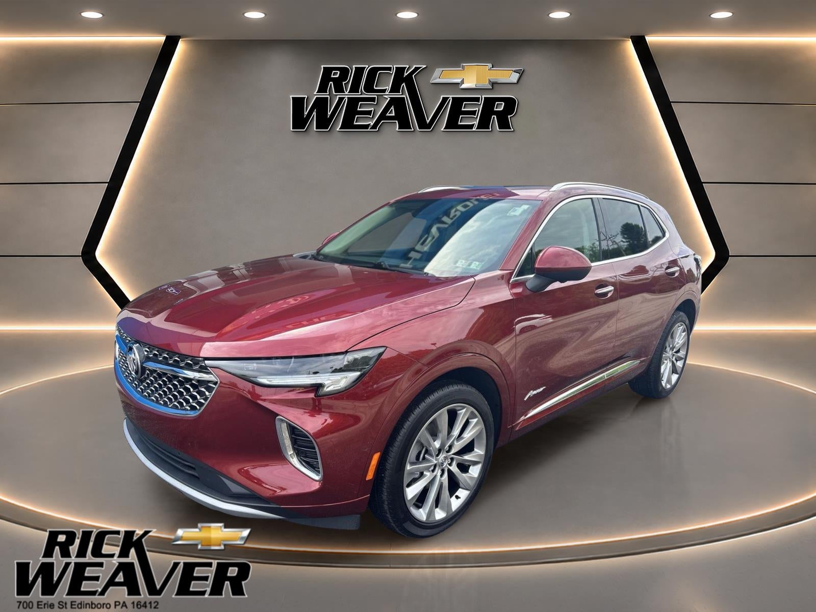 2023 Buick Envision Avenir in Cinnabar Metallic — front three-quarter view