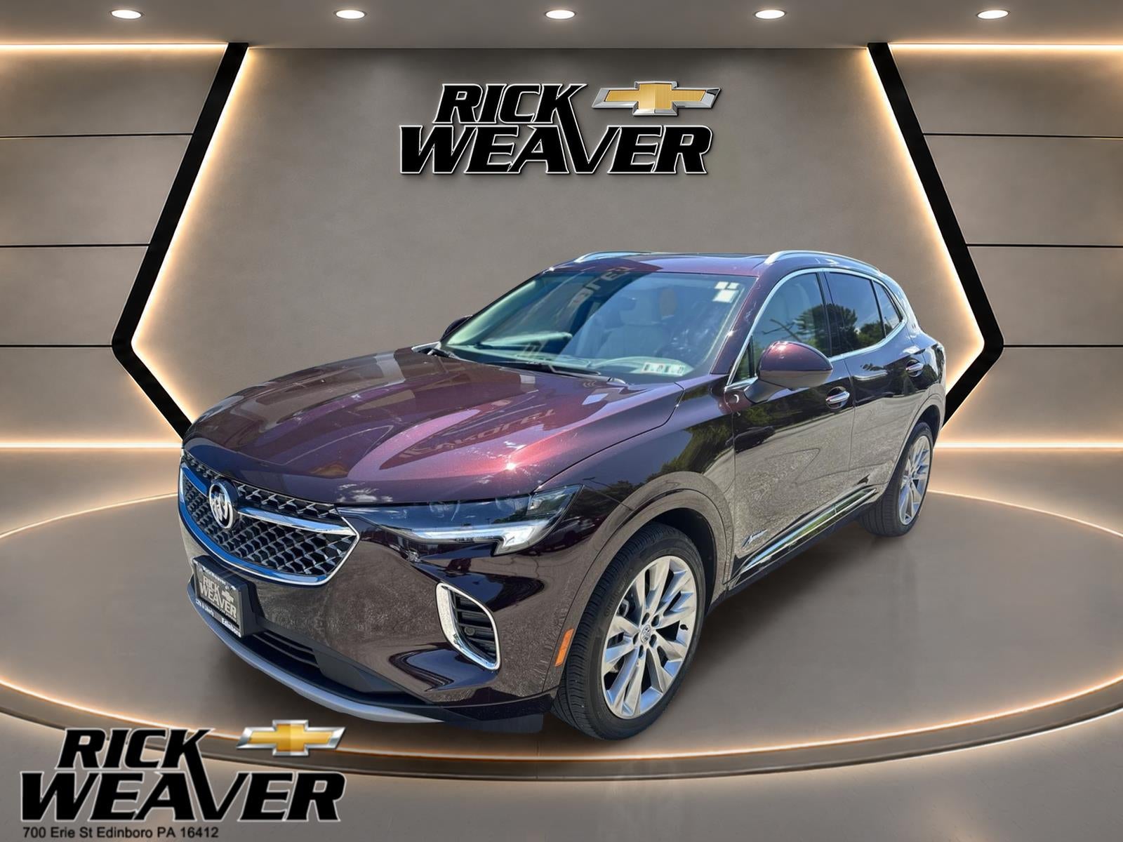 2023 Buick Envision Avenir in Rich Garnet Metallic — front three-quarter view